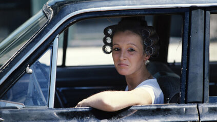 John Goodman photo of woman in a car