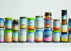 Jars of colored sand by Carly Glovinski