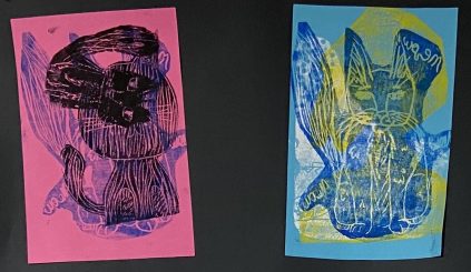 Two relief prints of cats